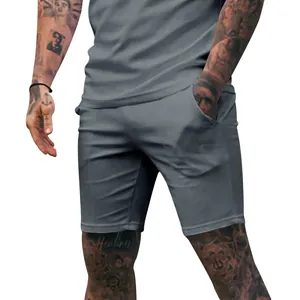 Close-up detail of men's solid grey casual sports shorts for summer fitness and gym