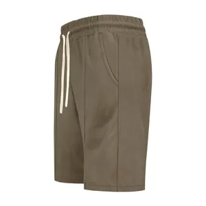 Side view of premium olive green textured golf shorts for men with elastic drawstring