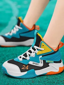 Kids' breathable mesh basketball shoes with vibrant blue and orange accents