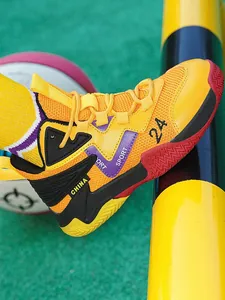 Breathable mesh basketball shoes for kids in vibrant yellow and orange colors