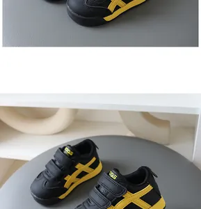 Nahaufnahme von stylischen schwarz-gelben Kindersportschuhen mit Klettverschluss