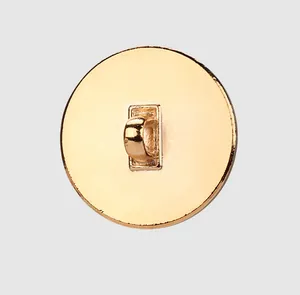 Detailed back view of a high-quality gold metal shank button for clothing