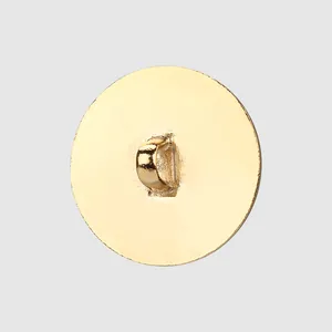 Professional back view of a classic round gold metal shank button for high-end clothing sewing