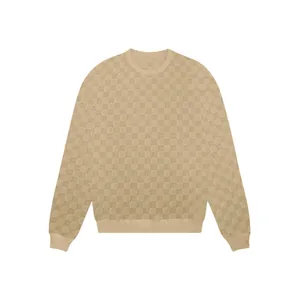 Détail du motif jacquard à damier kaki sur un t-shirt à manches longues et col rond pour homme.