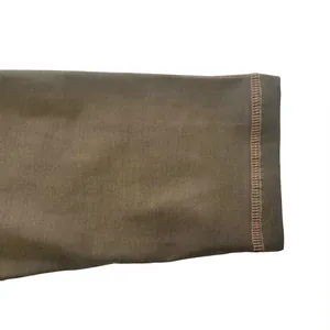 Close-up detail of reinforced stitching on heavyweight cotton Henley shirt sleeve