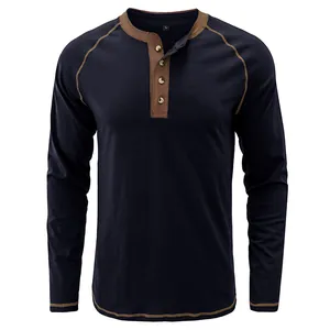 Front view of navy blue long sleeve cotton Henley shirt with brown trim detail.