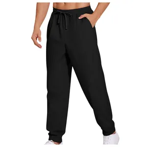 Detail view of men's black quick-dry sports joggers with drawstring elastic waist band