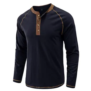 Dark blue long-sleeve Henley shirt with contrast brown trim and metal buttons design