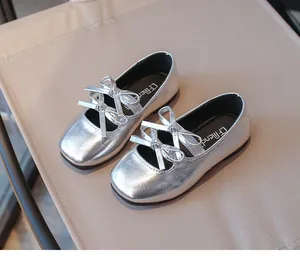 Metallic silver girls' Mary Jane flats with delicate bow and square toe detail