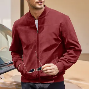 Close-up of a premium burgundy suede bomber jacket with ribbed cuffs on a male model