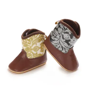 Detailed view of stylish winter baby boots with soft non-slip soles and patterned shafts