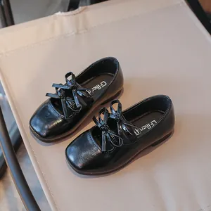 Elegant girls' black patent leather square toe shoes with stylish bow tie detail