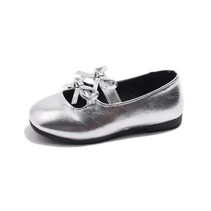 Shiny silver girls' Mary Jane flats with elegant bow detail for autumn fashion.