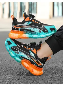 Children's sports shoes with breathable mesh and knob lacing system in black orange teal