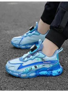 Close-up detail of boys' blue breathable mesh sports shoes with rotary dial buckle