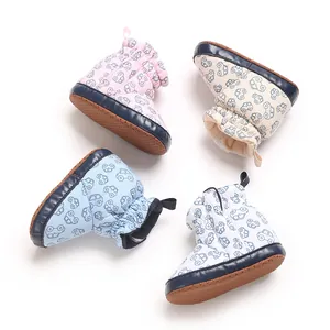 Variety of soft cotton baby booties with cute cartoon car patterns for newborns.