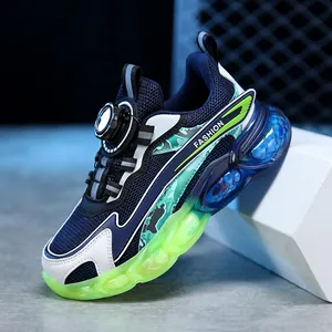 Premium boys breathable mesh running shoes featuring an innovative rotary buckle lacing system