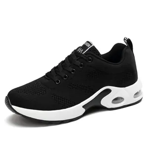 Stylish breathable black mesh running shoes for women featuring white air cushion sole