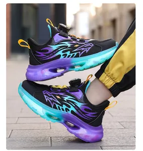 Detailed side view of boys' breathable sneakers with dragon graphics and air cushion sole