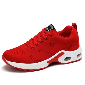 Vibrant red breathable mesh running shoes for women with cushioned air sole design