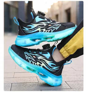 Side view detail of breathable boys' running sneakers with blue flame patterns