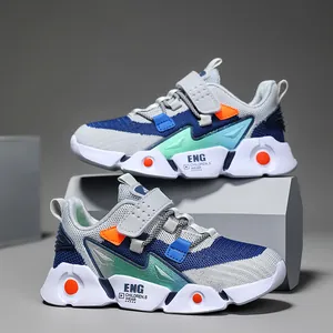 Stijlvolle ademende mesh sportsneakers voor jongens in marineblauw met levendige oranje accenten