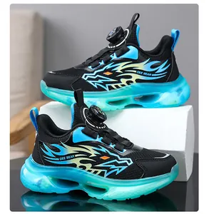 Close-up of boys' running shoes with breathable mesh and vibrant flame patterns