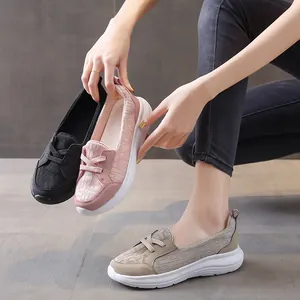 Close-up of three colors of casual women's slip-on sneakers with breathable knit upper