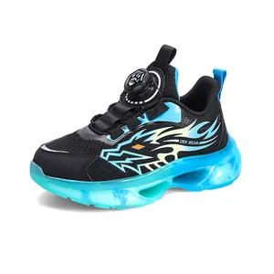 Boys mesh athletic sneakers featuring rotary buckle closure and translucent blue sole