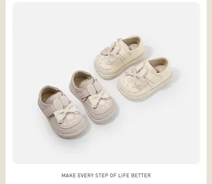 Cute toddler girls Mary Jane shoes featuring bunny ears and bows in pink and beige colors