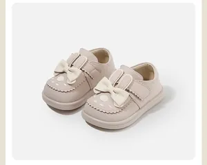 Detailed view of cute toddler girl princess shoes with 3D rabbit ears and bow decorations
