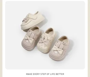 Detailed view of cute toddler girls' princess walker shoes with bunny ears and bows