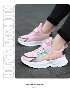 Detailed side view of breathable pink mesh running shoes for girls being worn