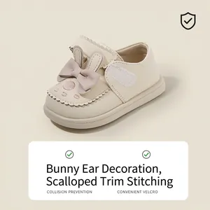 Adorable off-white baby girl princess walking shoes featuring rabbit ears and a sweet bow