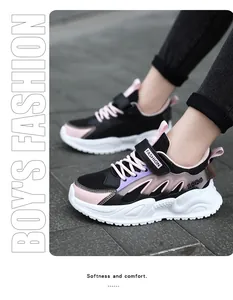Close-up detail of girls breathable mesh sports sneakers in black and pink stylish finish