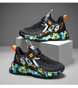 Detailed view of breathable mesh boys' running shoes with vibrant graffiti pattern designs