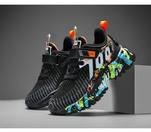Detailed close-up view of boy's breathable running shoes with colorful camo soles and 700 logo