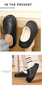 Detailed view of black plush-lined winter clogs for indoor and outdoor warmth.