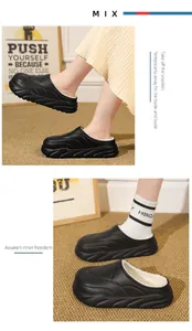 Close-up of stylish black fleece-lined clogs with thick soles for cozy indoor warmth