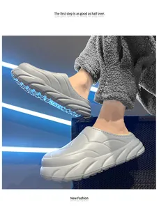 Detail view of grey fleece-lined platform slippers with wave pattern and warm plush interior