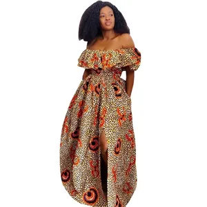 Vestido largo con estampado africano, hombros descubiertos, volantes y abertura