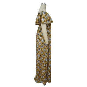 Perfil lateral de un vestido largo con hombros descubiertos y patrón geométrico amarillo