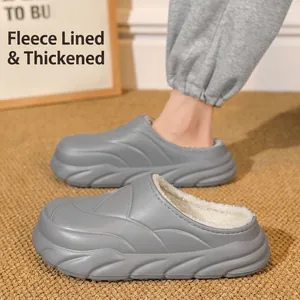 Warm grey plush-lined slippers with thick waterproof EVA soles for cozy indoor winter comfort