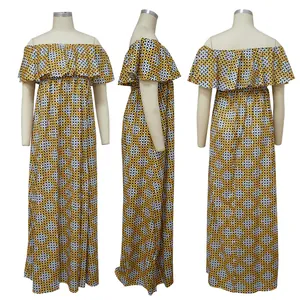 Detalle multiangular de vestido largo con estampado geométrico amarillo y volantes