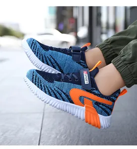 Blue and orange fly-knit kids' sports shoes with breathable mesh and velcro strap.