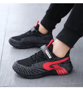 Detailed side view showing textures of boys' knit breathable sports sneakers in red