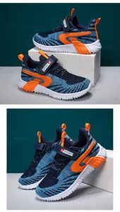 Detail view of boys' breathable fly-knit running sneakers in blue and orange colors.