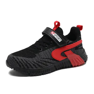 Boys breathable fly-knit sports shoes with lightweight sole and red accents.