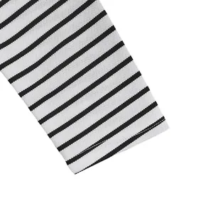 Detailed close-up view of a long sleeve cuff featuring black and white horizontal stripes