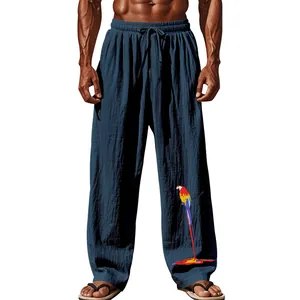 Détail du pantalon décontracté en coton et lin pour homme avec imprimé perroquet